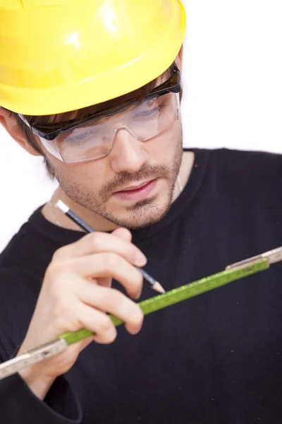 Trabalhador da construção com caneta — Fotografia de Stock