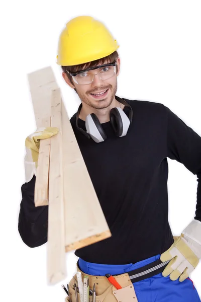 Arbeiter, der Holz trägt — Stockfoto