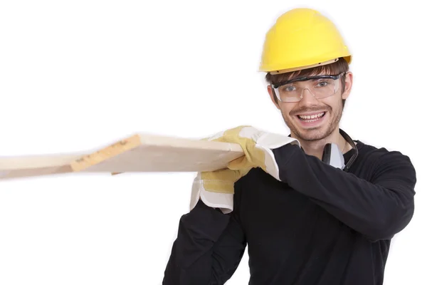 Construction worker carrying wood — Stock Photo, Image