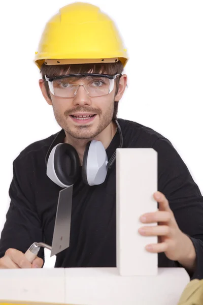 Trabajador de construcción con ladrillo —  Fotos de Stock