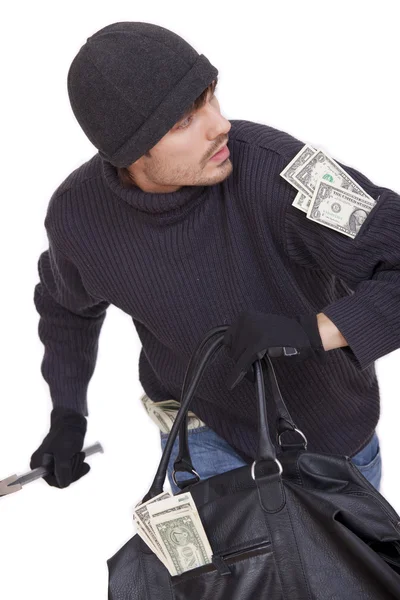 Банківський грабіжник працює з грошима — стокове фото