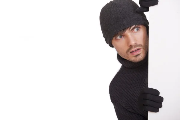 Hiding burglar — Stock Photo, Image