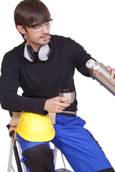 Trabajador de la construcción beber café — Foto de Stock