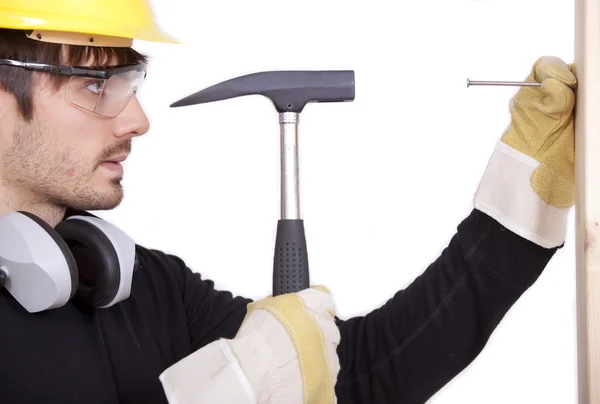 Handyman with hammer — Zdjęcie stockowe