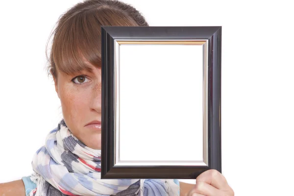 Sad woman with photo frame — Stock Photo, Image