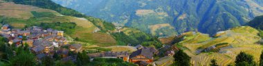 Rice terraces and old Chinese village clipart