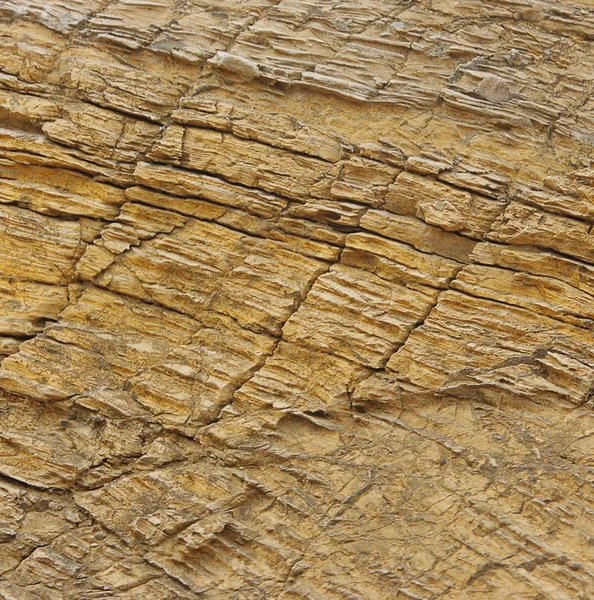 Gouden textuur van de steen — Stockfoto