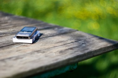 Silver mobile phone on the table