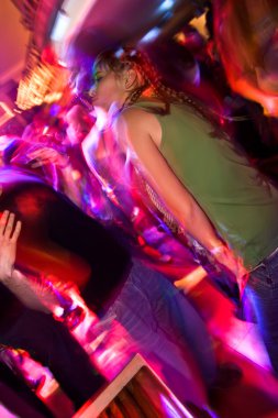 Young girl partying in the nightclub clipart