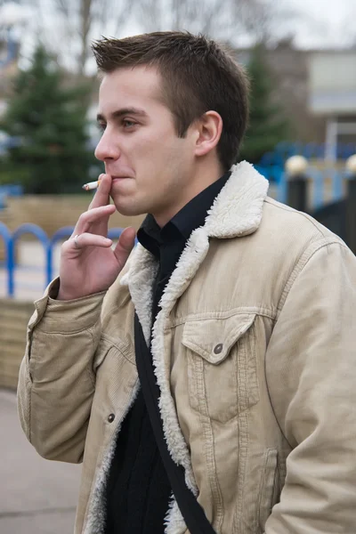 Smoking young guy