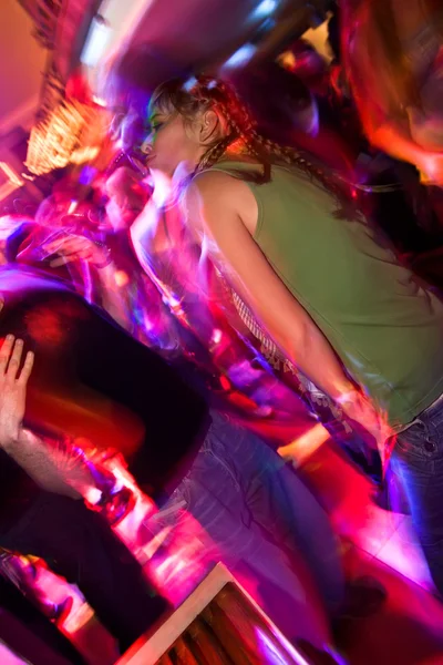 stock image Young girl partying in the nightclub