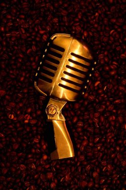 Retro-styled golden microphone clipart