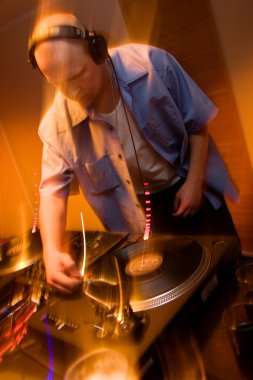Hip-hop deejay playing vinyl record clipart