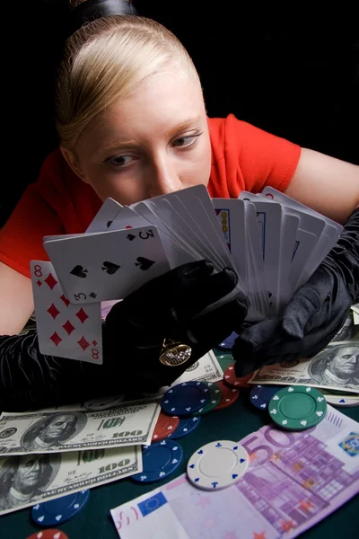 Young smiling woman on the poker table — Stock Photo, Image