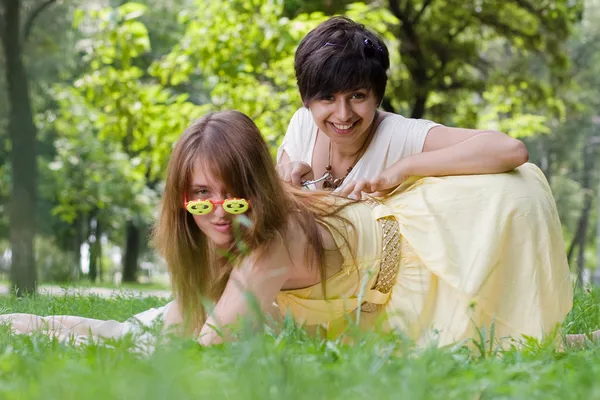 Two young girls having fun outdoors — Stock Photo, Image
