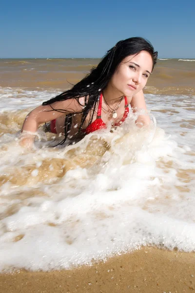 Sexy young adult woman at the sea — Stock Photo, Image