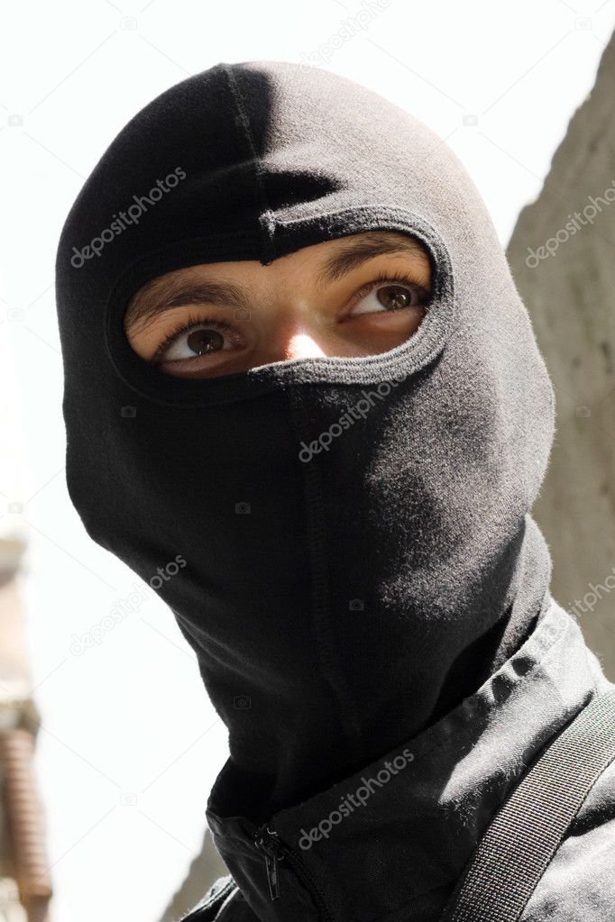 Portrait of a soldier in black mask