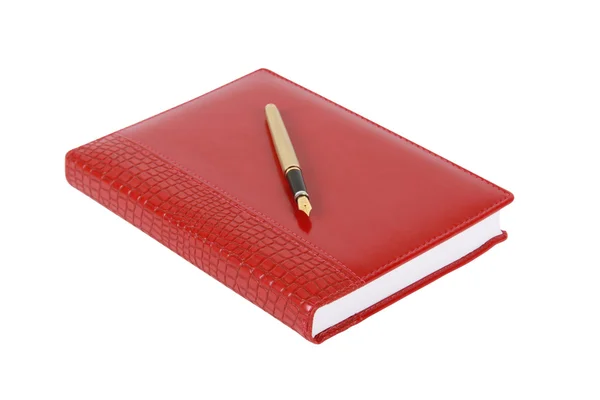 Rode leater Kladblok en pen — Stockfoto