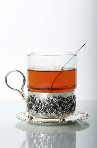 Povzbuzující čaj v sklo hrnek — Stock fotografie