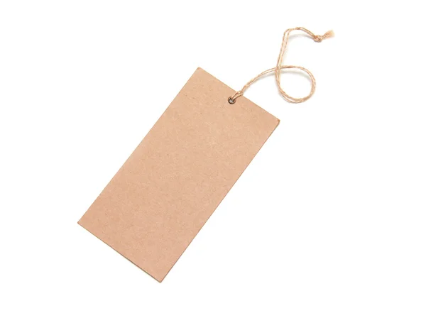 Blank tag tied with brown string. — Stock Photo, Image