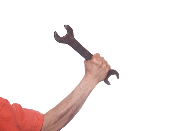 Hand met een moersleutel — Stockfoto