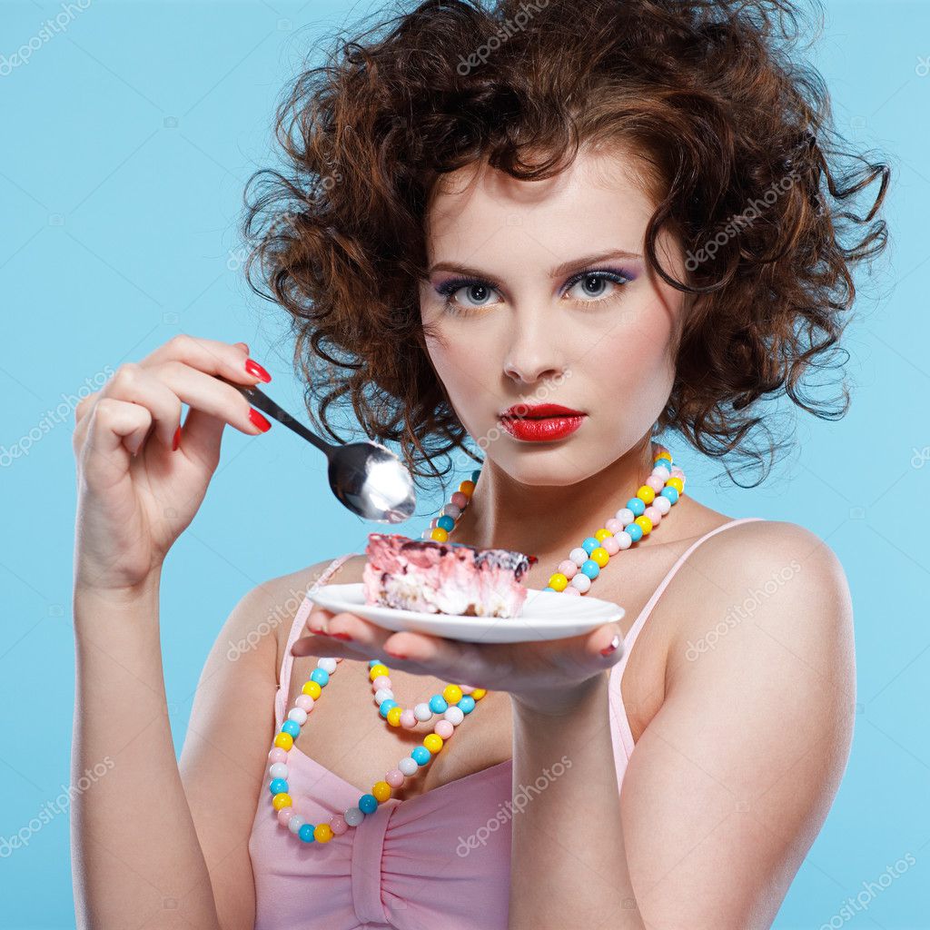 l figure eating cake
