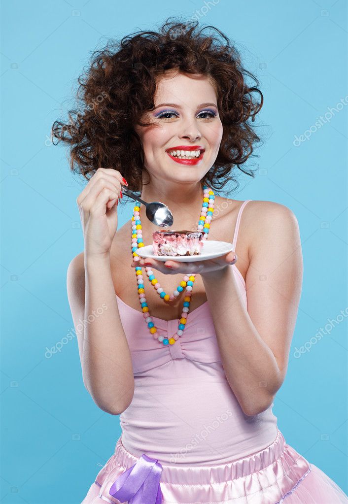l figure eating cake
