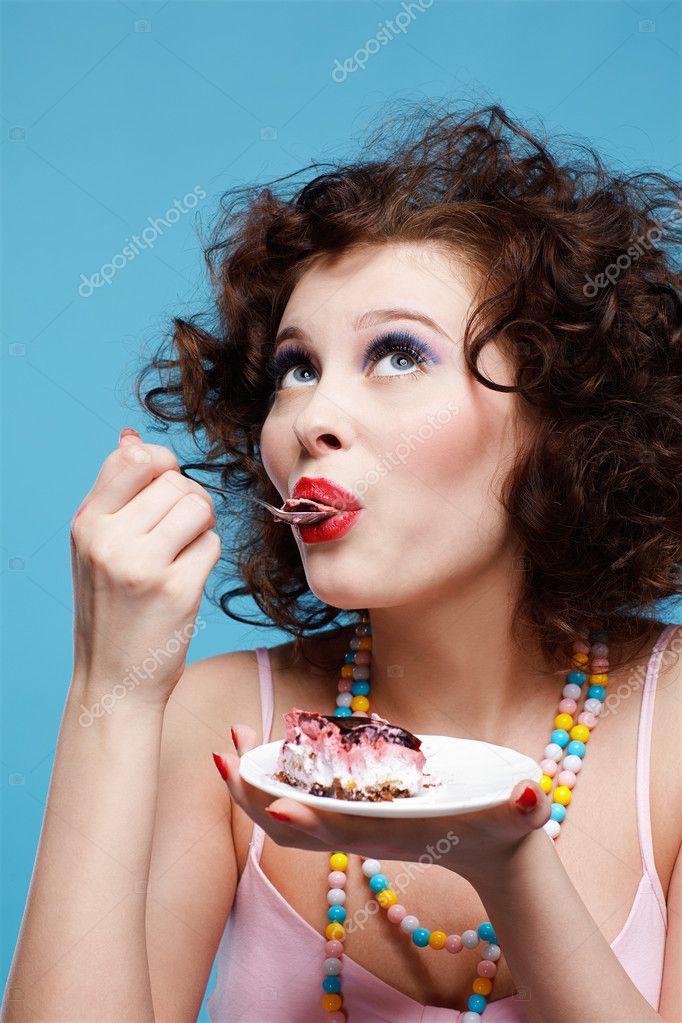 l figure eating cake