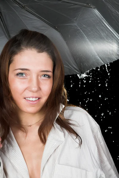 Girl with umbrella in rain — Stock Photo, Image