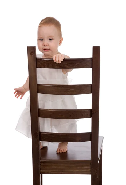 Dítě s židlí — Stock fotografie