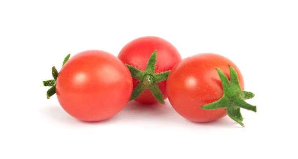 Small tomatoes on a white background — Stock Photo, Image