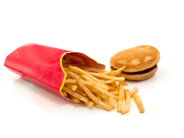 Horké čerstvé hranolky a hamburger — Stock fotografie