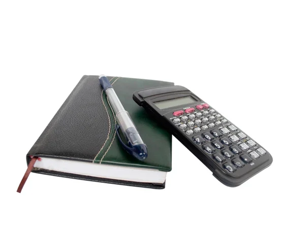 Ноутбук, калькулятор, рукоятка записи — стоковое фото