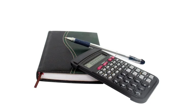 Carnet, calculatrice, poignée d'écriture — Photo