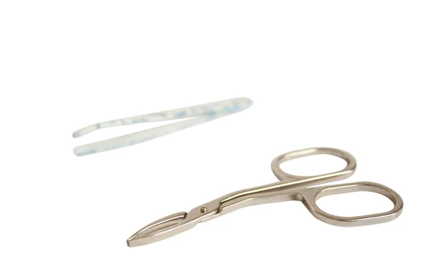 Manicure scissors and tweezers — Stock Photo, Image