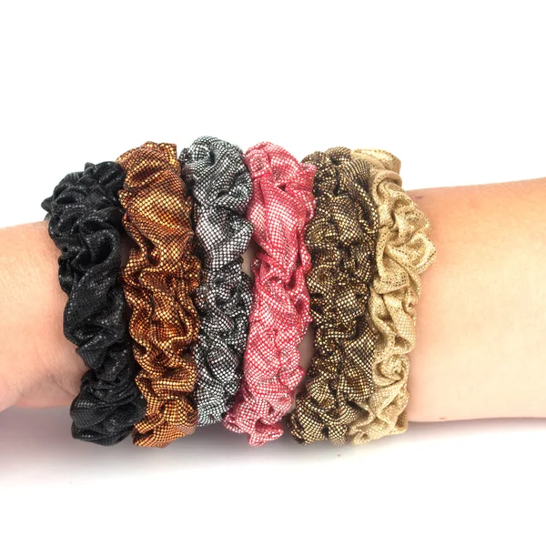 stock image Elastic bands of hair multi-colored on a hand