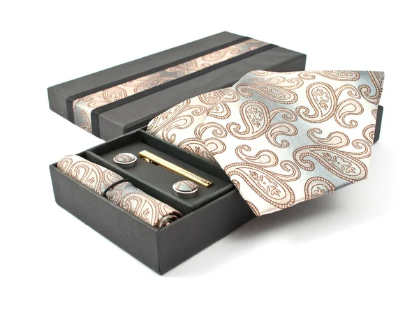 Kol düğmesi ile bir kutu içinde kravat — Stok fotoğraf