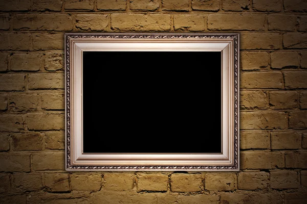 Bakstenen muur met een frame — Stockfoto