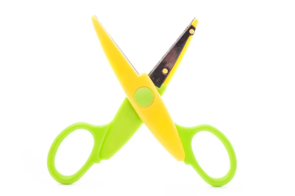 Зеленые и желтые ножницы — стоковое фото