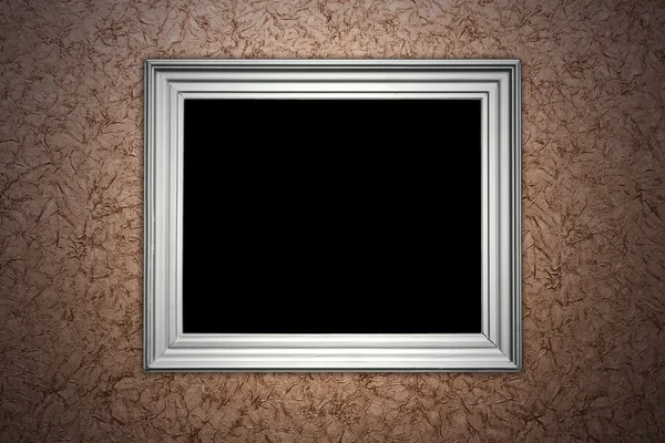 Resim çerçevesi ile kahverengi duvar — Stok fotoğraf