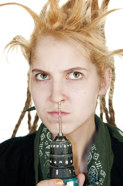 Girl with a drill in nose — Stock Photo, Image