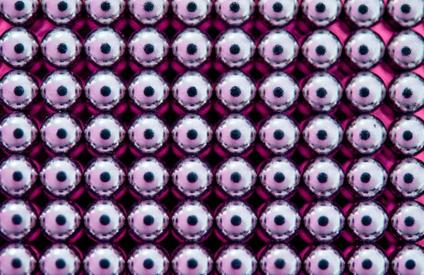 Shiny pink beads background — Stock Photo, Image