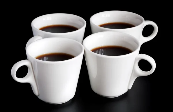 Vier koffie cups — Stockfoto