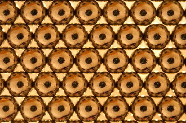 stock image Shiny gold beads background