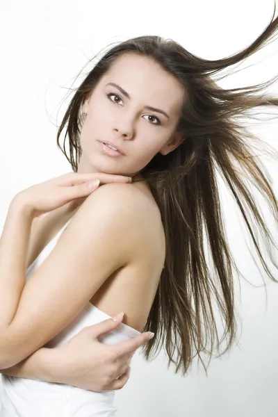 Donna con vento nei capelli — Foto Stock