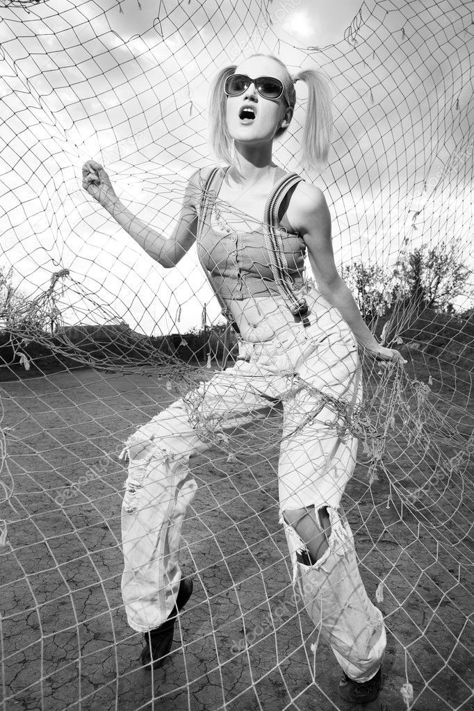 Fashion model behind net webbing Stock Photo by ©krivenko 3211350