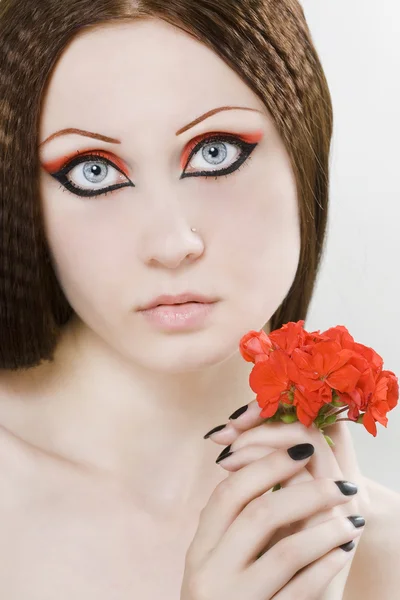 Portret van een jonge vrouw met make-up — Stockfoto