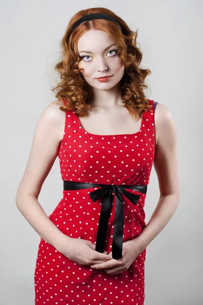 Beautiful woman wearing red dress — Stock Photo, Image