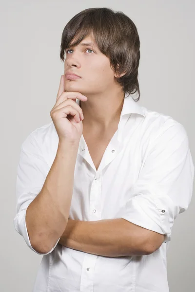 Handsome young man thinking — Stock Photo, Image