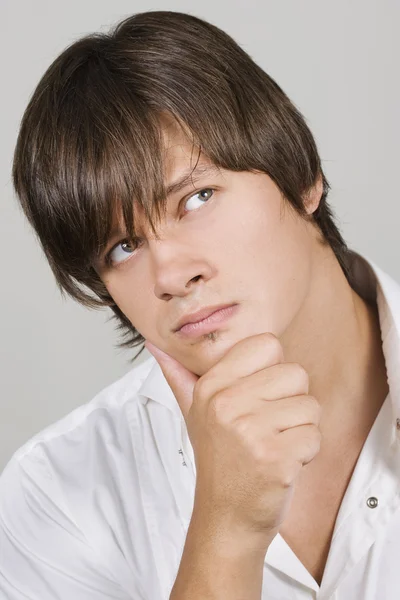 Handsome young man thinking — Stock Photo, Image